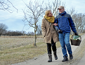 Couple having an autumn picnic