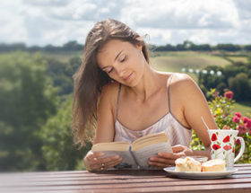 woman reading outside