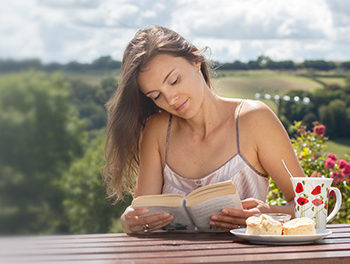 woman reading outside