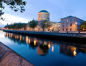 View of Liffey and Four Courts in Dublin in the evening