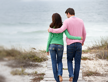 happy couple on the beach