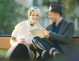 Couple flirting on a bench